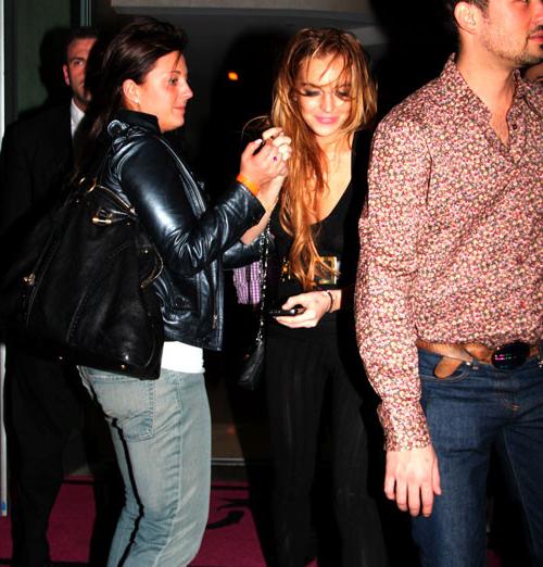 16P Lindsay Lohan showing her ass in see thru pants