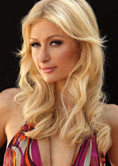 16P Paris Hilton showing her nice small tits in yacht