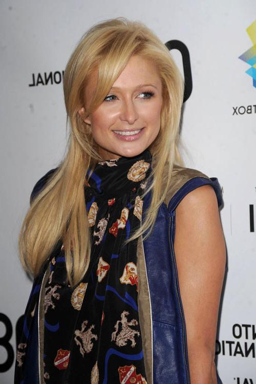 16P Paris Hilton showing her nice small tits on yacht