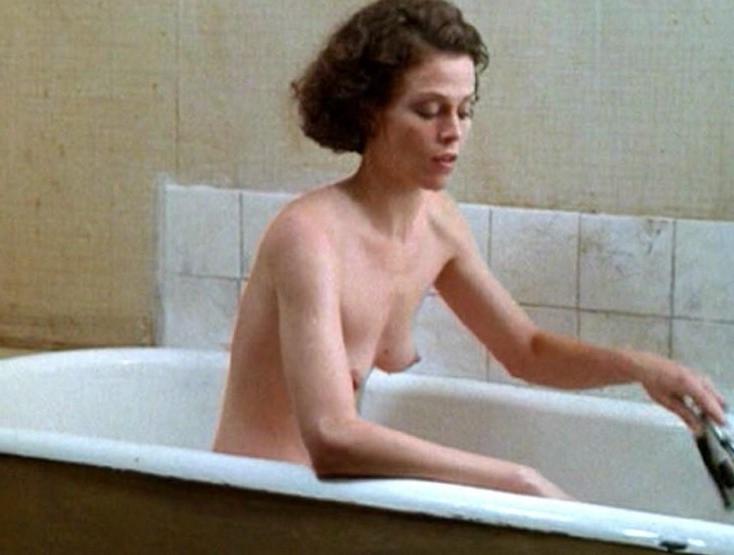 16P Sigourney Weaver shows pert titties and bush