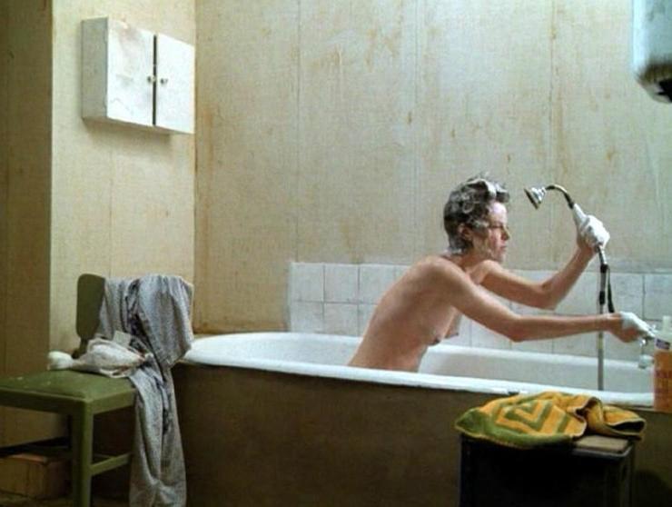 16P Sigourney Weaver shows pert titties and bush