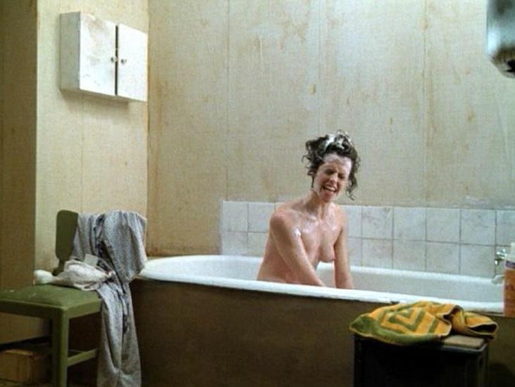 16P Sigourney Weaver shows pert titties and bush