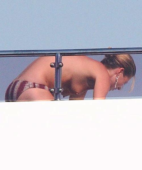 16P Kate Moss showing her nice small tits on yacht paparazzi pics