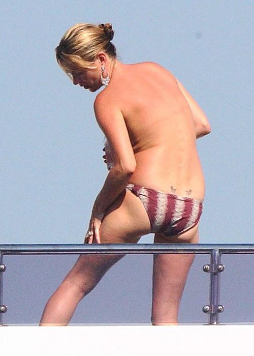 16P Kate Moss showing her nice small tits on yacht paparazzi pics