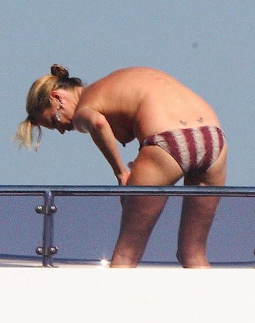 16P Kate Moss showing her nice small tits on yacht paparazzi pics