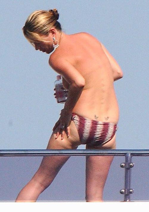 16P Kate Moss showing her nice small tits on yacht paparazzi pics