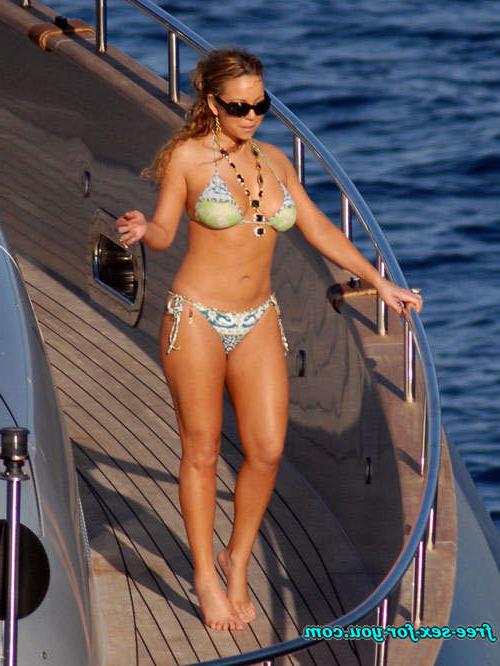 16P Mariah Carey posing in skimpy bikini on yacht paprazzi pix