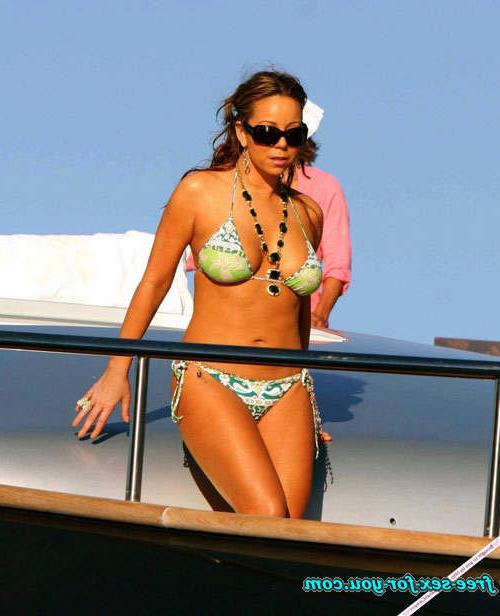 16P Mariah Carey posing in skimpy bikini on yacht paprazzi pix