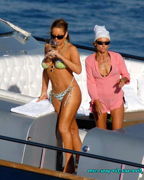 16P Mariah Carey posing in skimpy bikini on yacht paprazzi pix