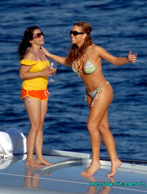 16P Mariah Carey posing in skimpy bikini on yacht paprazzi pix