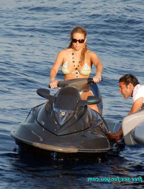16P Mariah Carey posing in skimpy bikini on yacht paprazzi pix