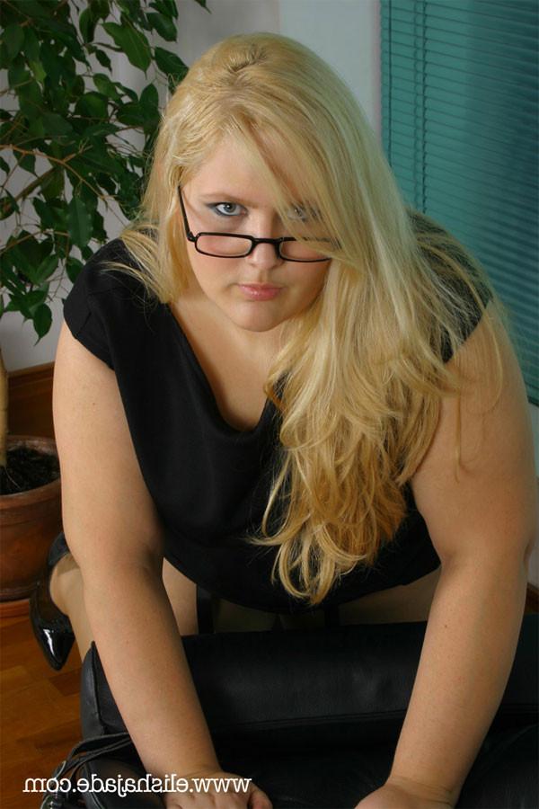 17P Blonde sexy secretary in glasses and stockings teasing
