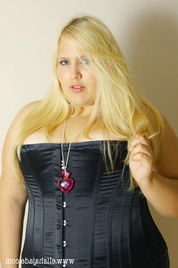 17P Sexy blonde secretary in seamed stockings teasing