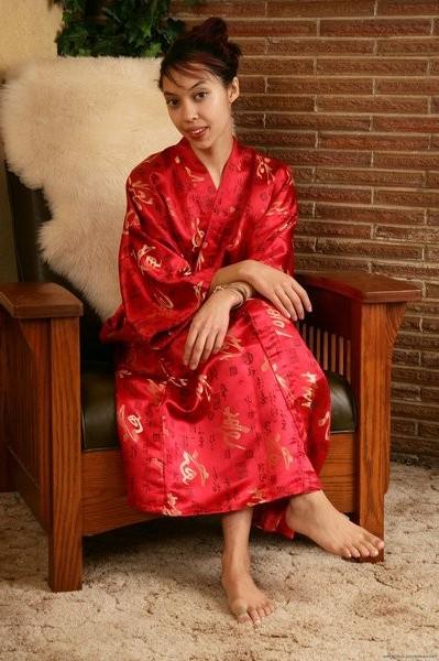15P Natural girl Miyu shows off tats and her hairy pussy