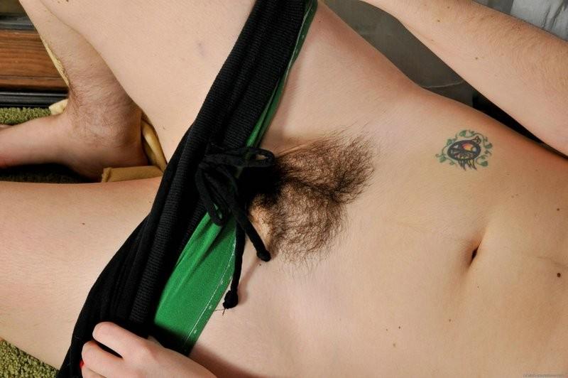 15P Super hairy Simone displays her thick pussy