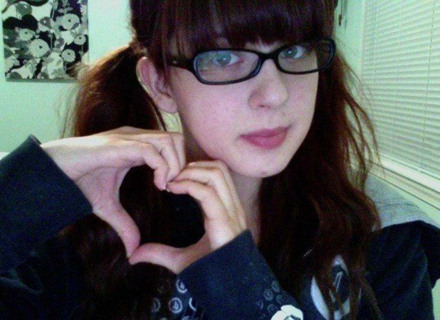 15P Photos of a flaming hot geeky amateur bitch