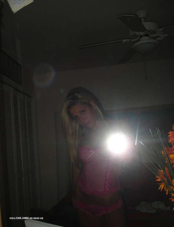 16P Pictures of a sexy babe trying on her mom's lingerie