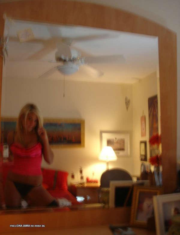 16P Pictures of a sexy babe trying on her mom's lingerie