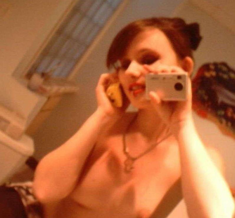 16P Pictures of a big-tittied babe camwhoring