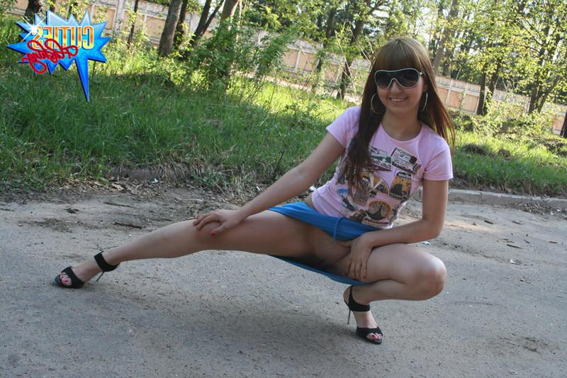 16P Adventurous teen bares tits and slit in the street