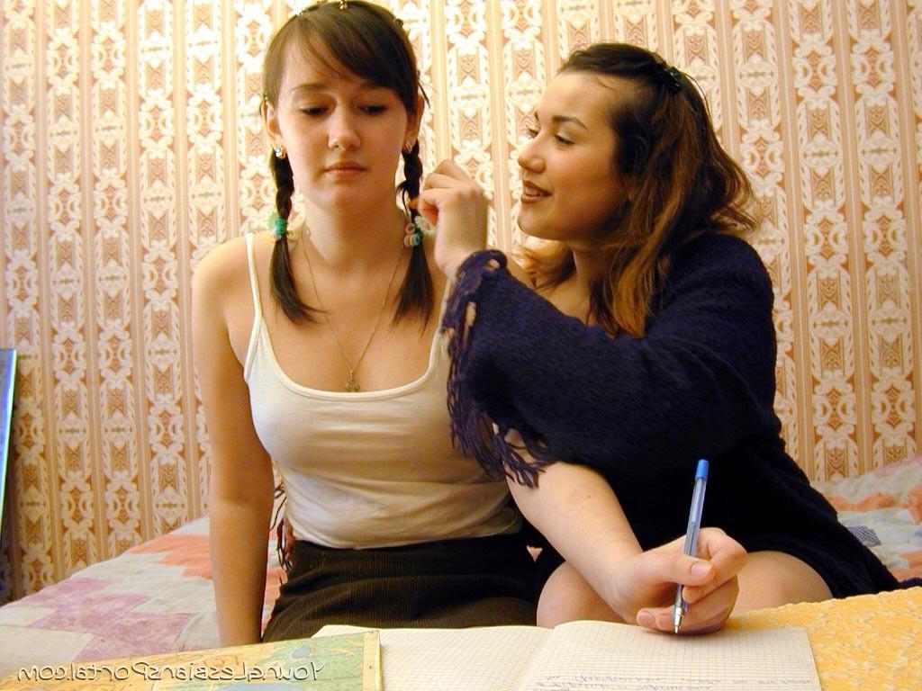 12P Two beautiful young lesbians enjoy stretching their pussies after doing their ho