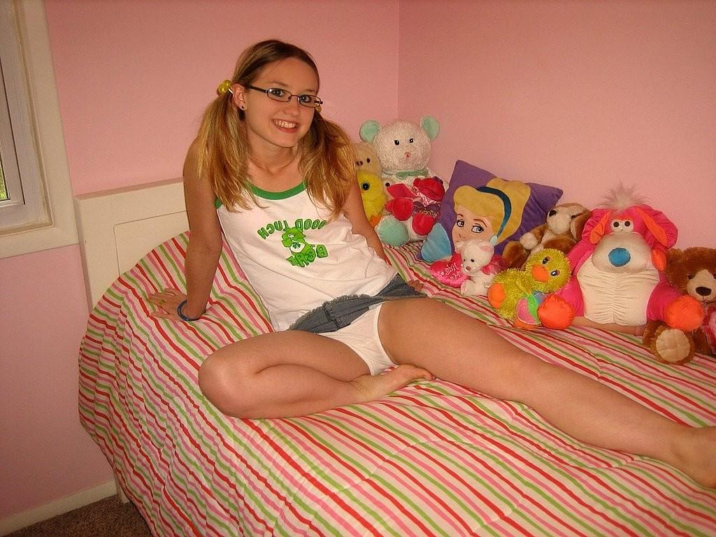 15P Nerdy blonde girl next door likes a huge rubber dildo