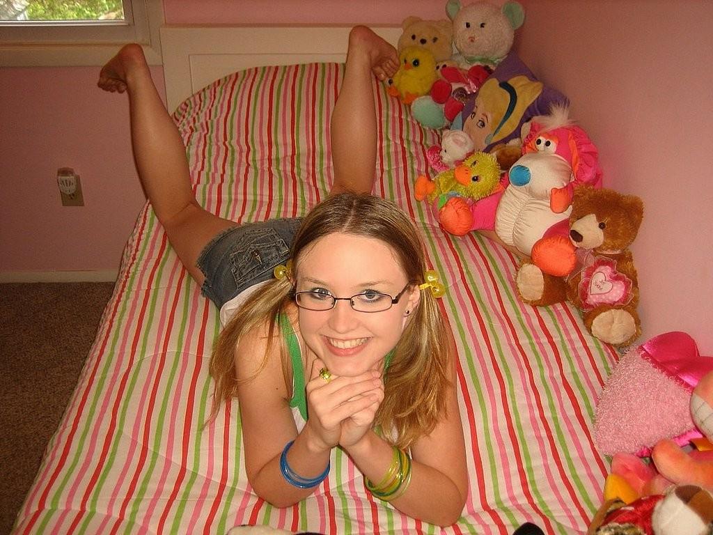 15P Nerdy blonde girl next door likes a huge rubber dildo