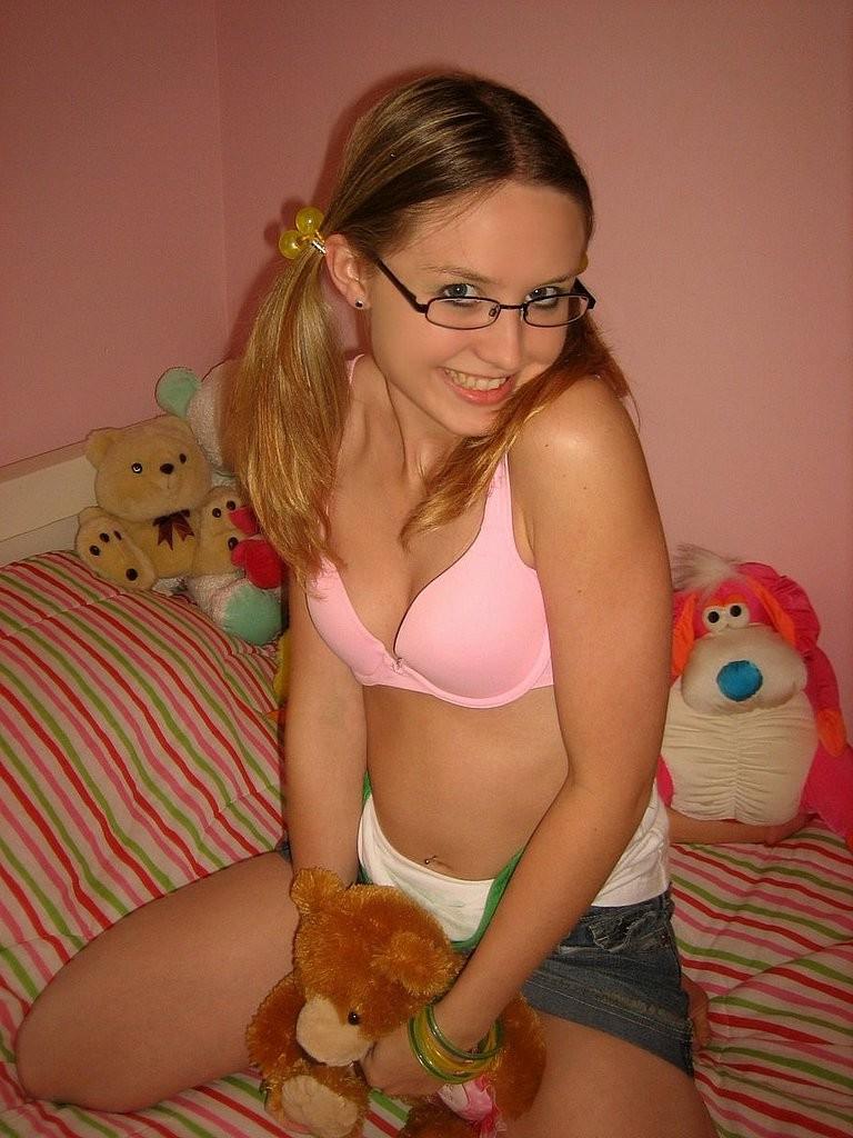 15P Nerdy blonde girl next door likes a huge rubber dildo