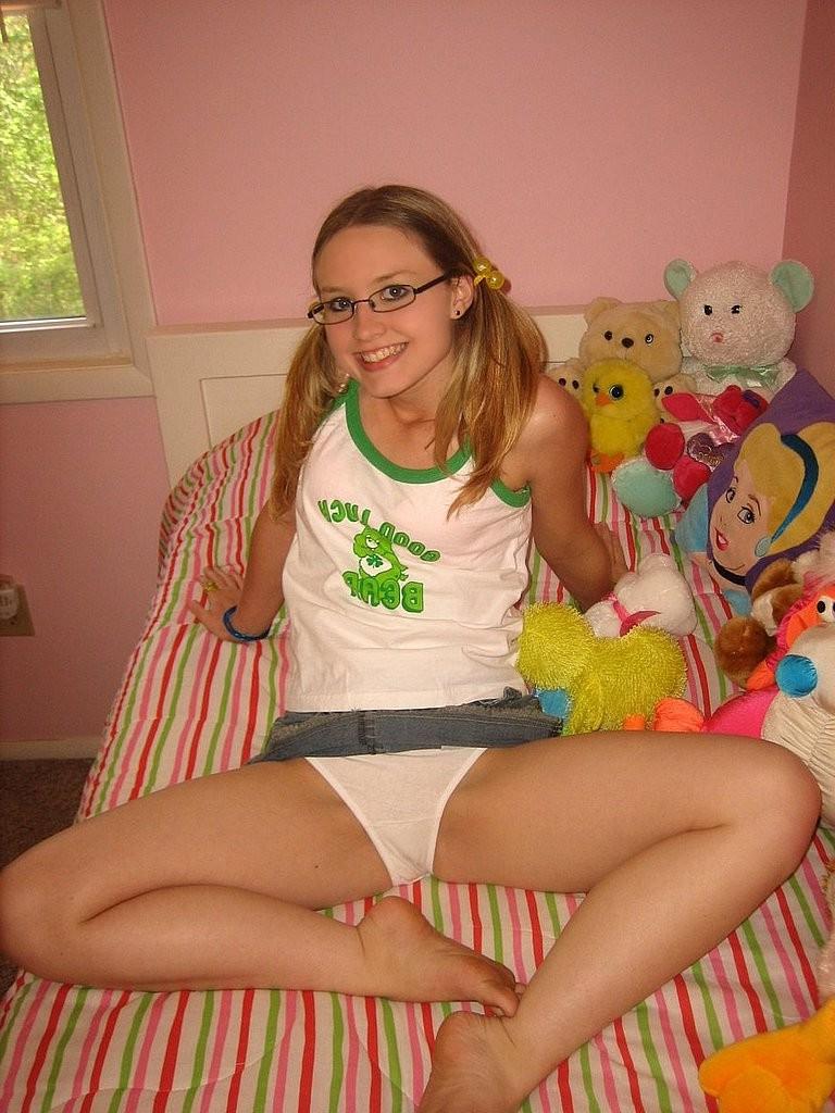 15P Nerdy blonde girl next door likes a huge rubber dildo