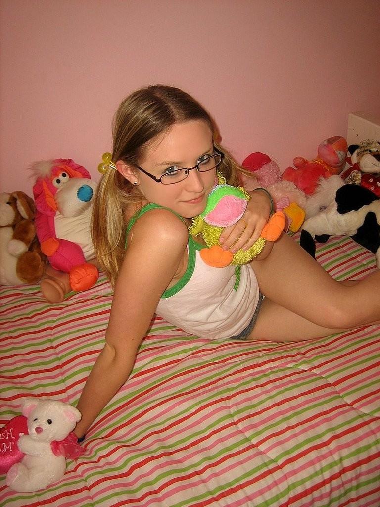 15P Nerdy blonde girl next door likes a huge rubber dildo