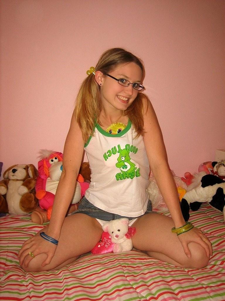 15P Nerdy blonde girl next door likes a huge rubber dildo