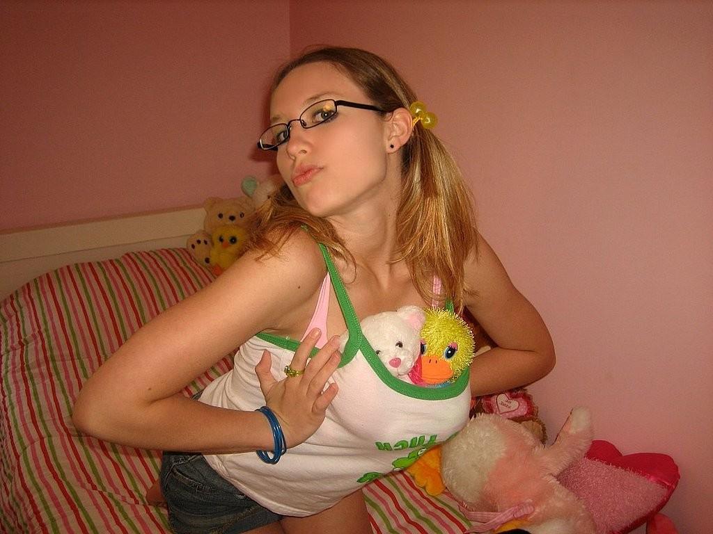 15P Nerdy blonde girl next door likes a huge rubber dildo