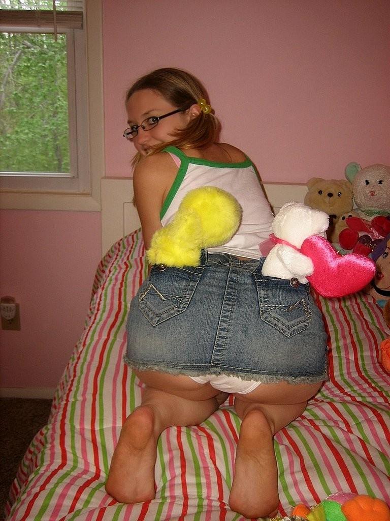 15P Nerdy blonde girl next door likes a huge rubber dildo