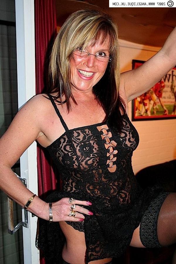 12P Angelique stretching her stockinged legs