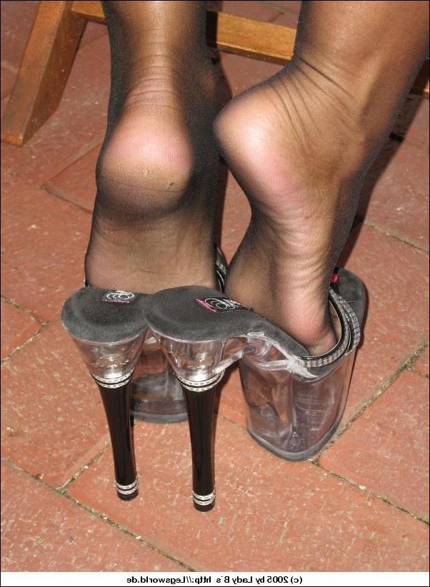 12P Kinky german lady in high heels shows her sexy feet