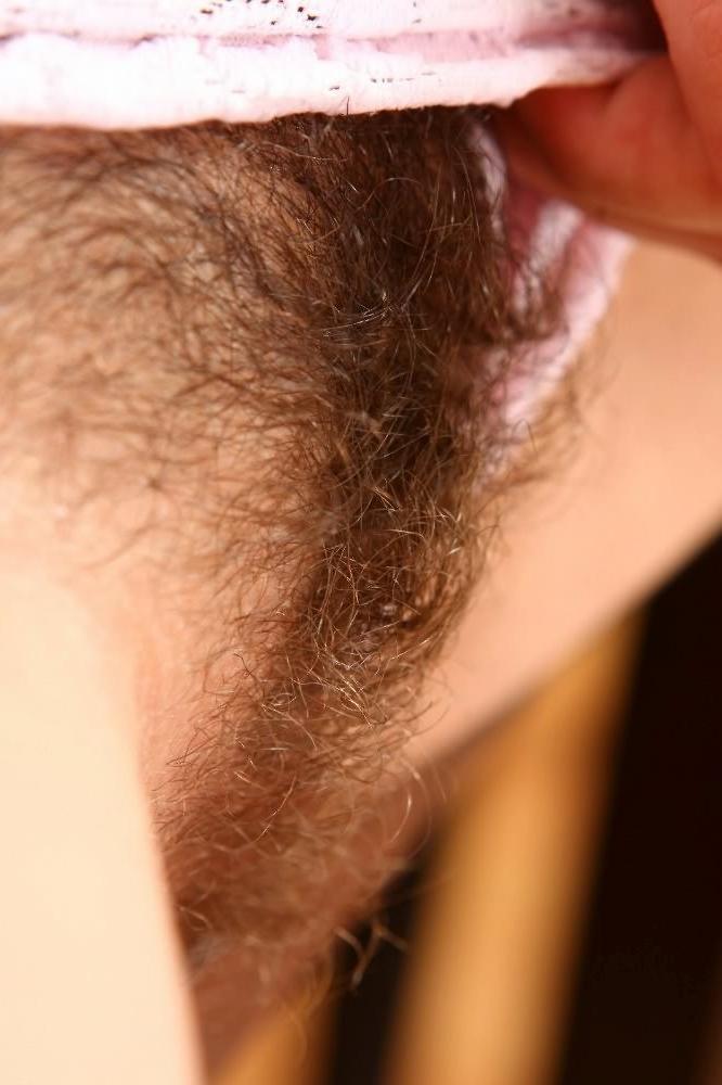 15P Really hairy bush on this brunette teen