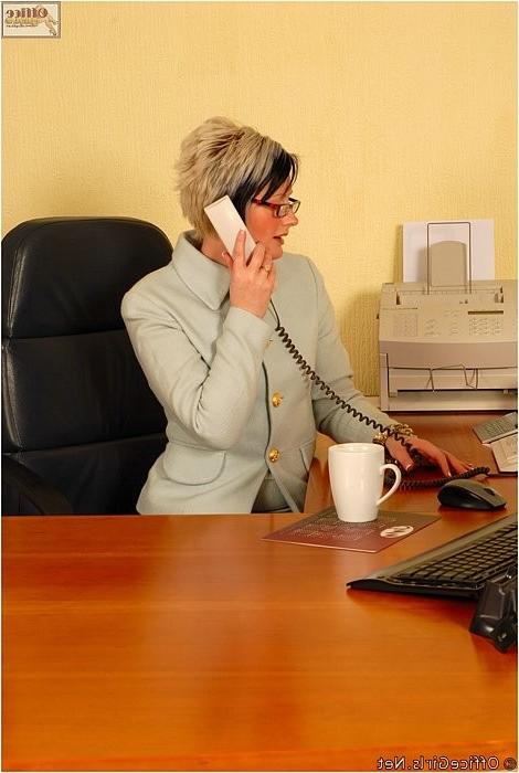 15P Blonde secretary Sally Taylor in womanssuit and stripe stockings