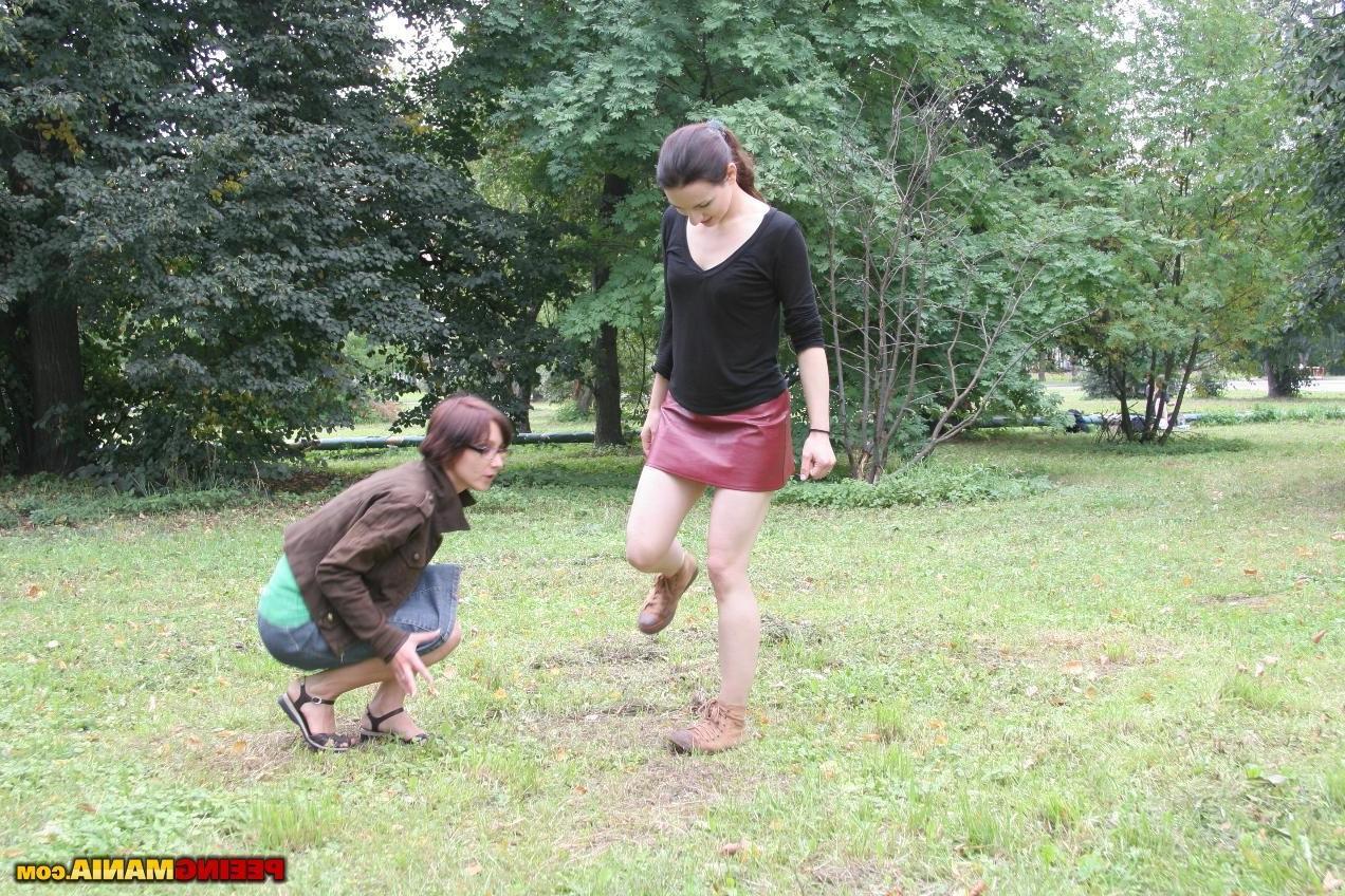 10P Two lesbian popsies flash their boobs and twats and urinate outdoors