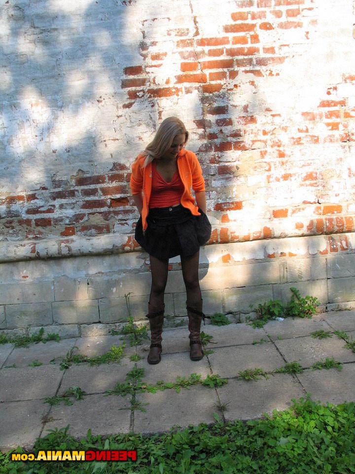 15P Beautiful girl with black skirt toilets somewhere on the open road