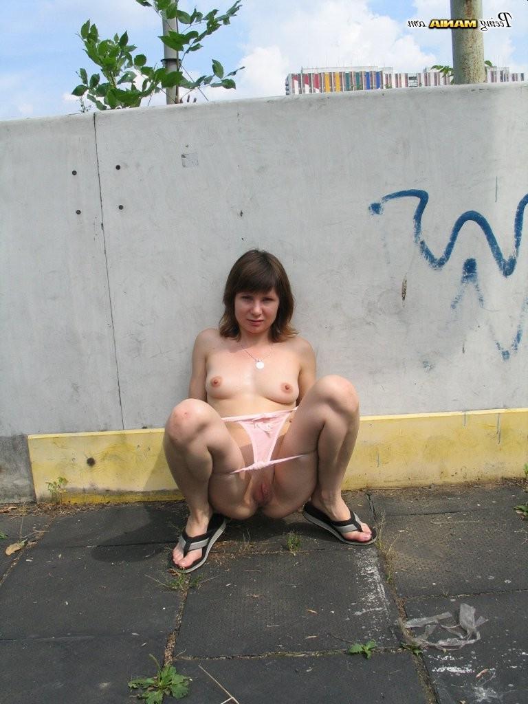 15P Impudent naked chickie does a piss and shows off in a public place