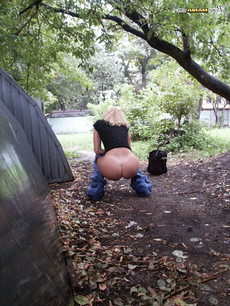 15P From-behind spying on a slender blonde gal in jeans as she does a pee