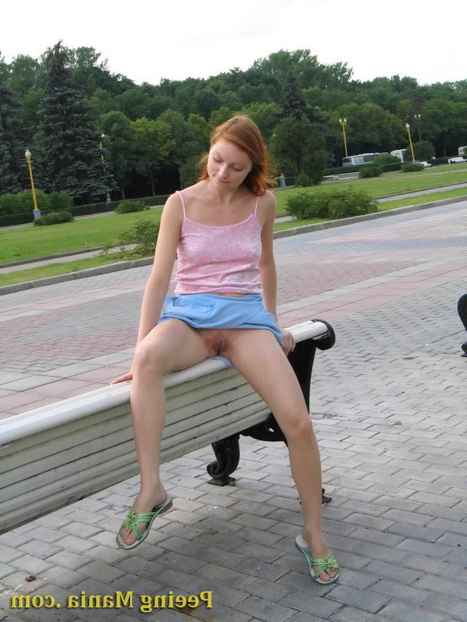 15P Playful babe empties her bladder sitting on the bench back in the park