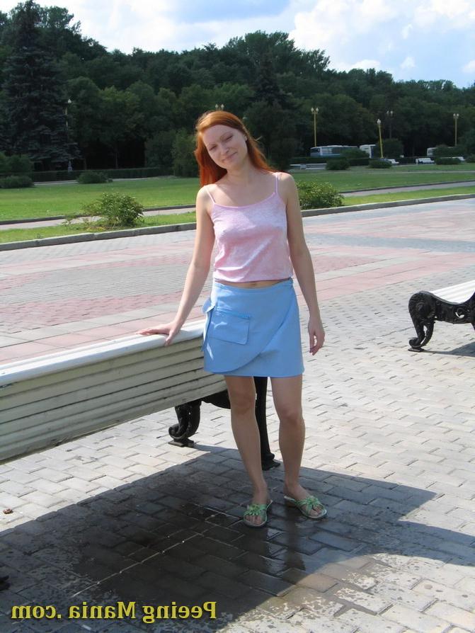 15P Playful babe empties her bladder sitting on the bench back in the park
