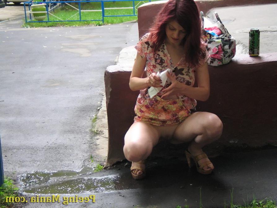 15P Jolly chick drinks in the street and then does a piss there bravely