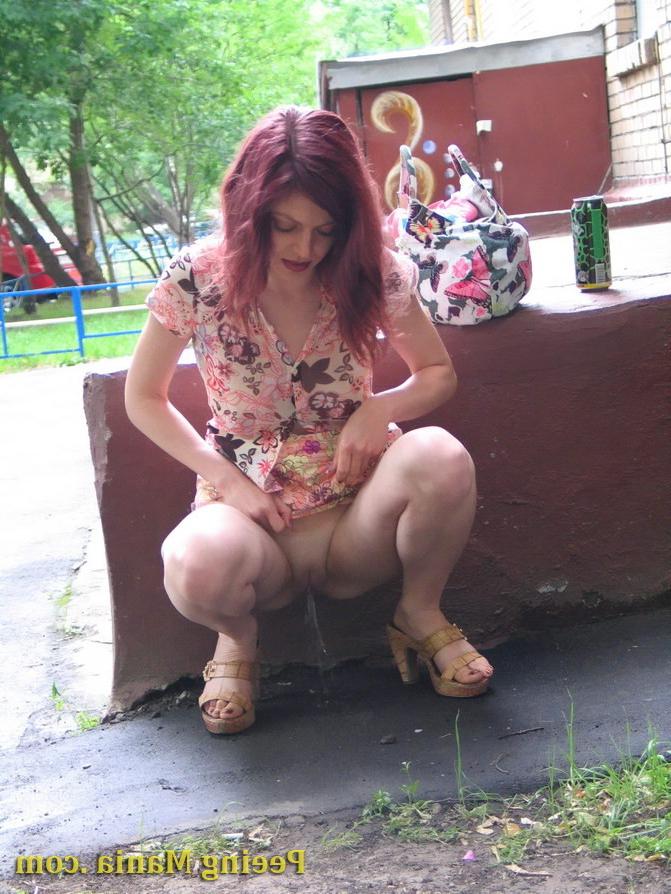 15P Jolly chick drinks in the street and then does a piss there bravely