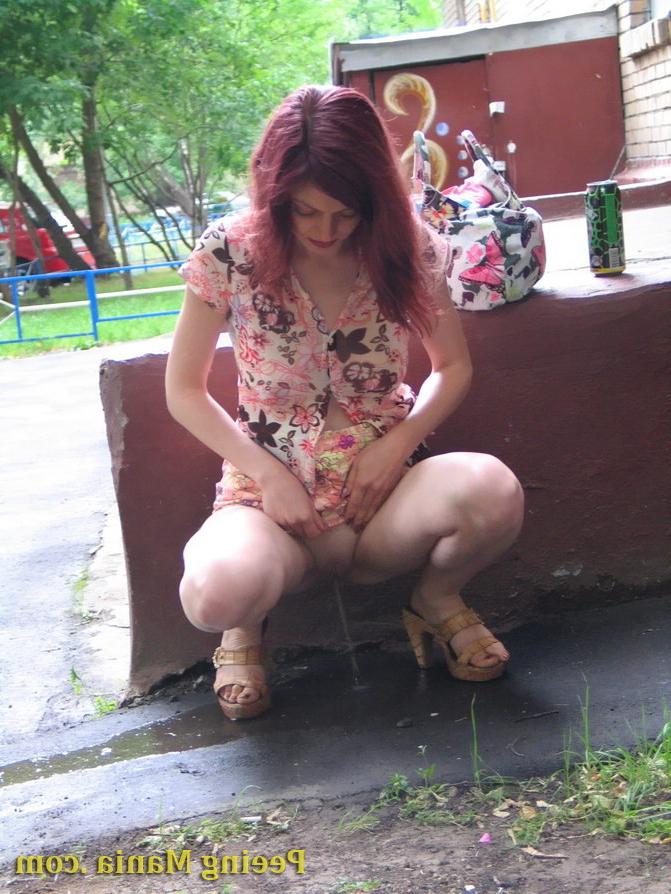 15P Jolly chick drinks in the street and then does a piss there bravely