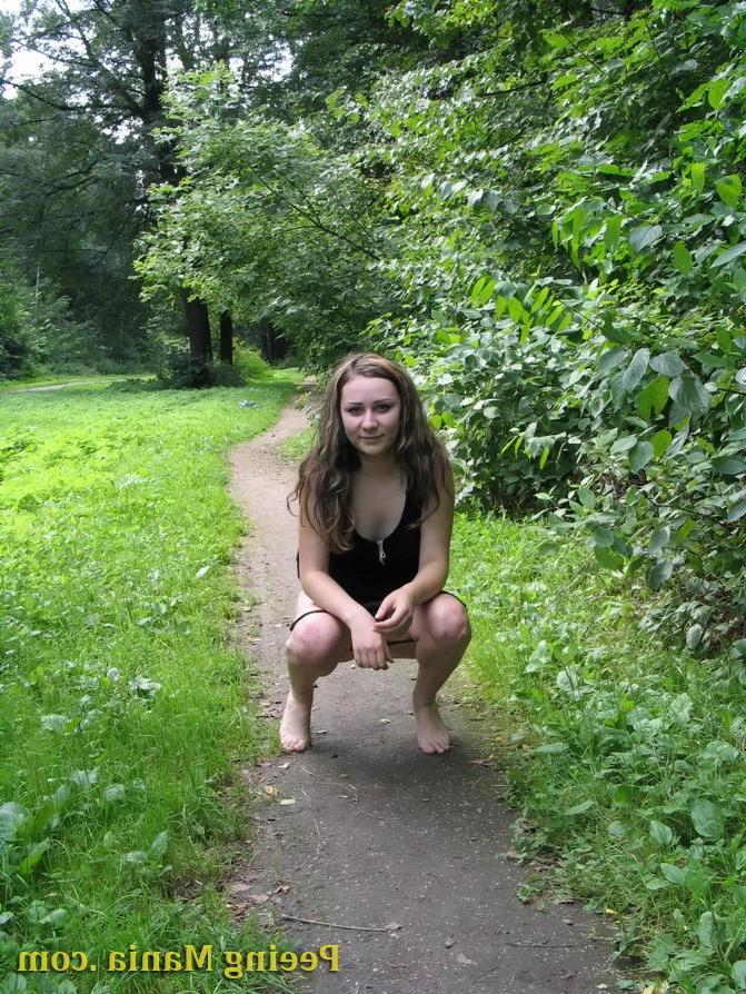 15P Cute gal lays bare her pussy and shows her pissing talents in the park