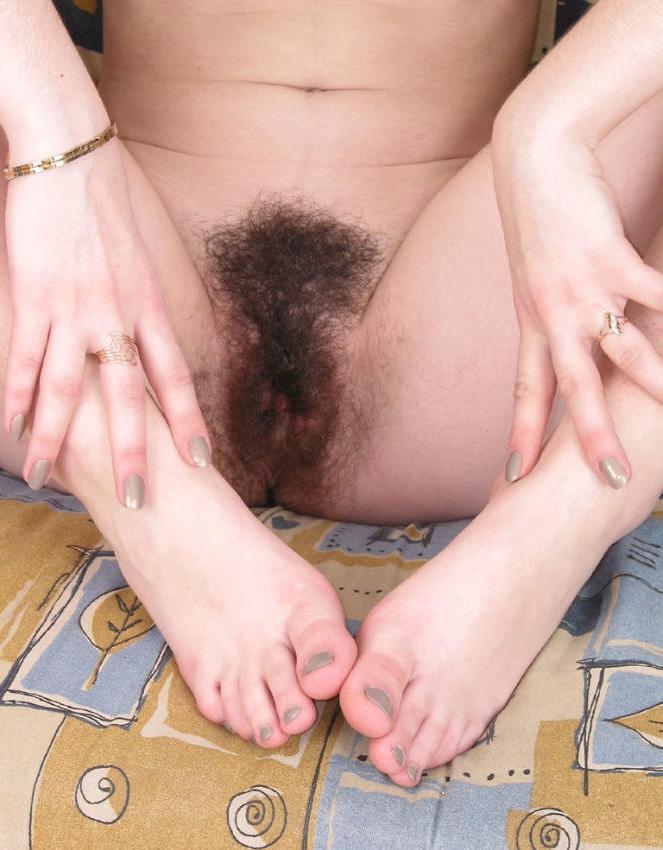 15P Sexy pigtailed gal with hairy pussy
