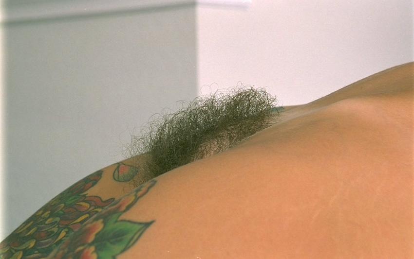 20P Tattooed slut spreading hairy pussy