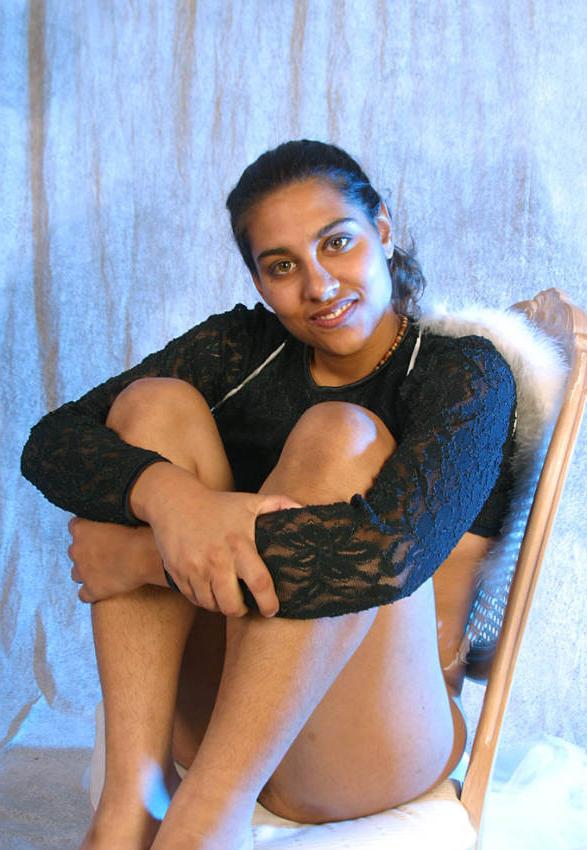 20P Pigtailed cutie spreads hairy pussy